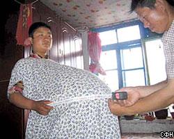 Китаянка притворялась беременной пятерней ради больного мужа [02.04.2007 18:00]