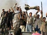 Шиитские боевики в Ираке устроили расправу над безоружными людьми в суннитском районе в отклик на двойной теракт [28.03.2007 13:27]